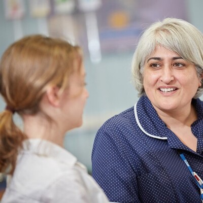 Picture of a nurse and a young person