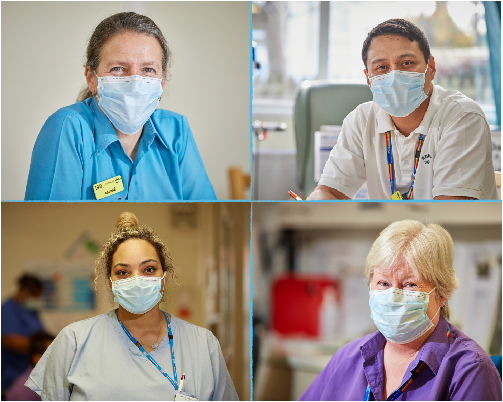 Photo of four clinicians smiling while working