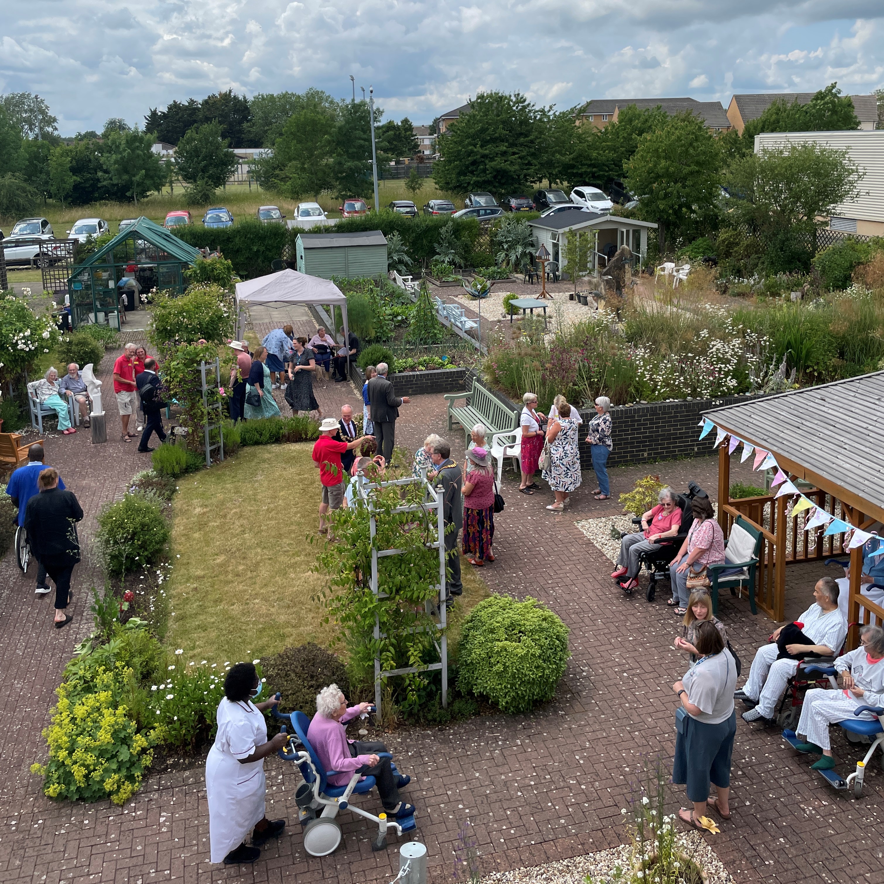 An aerial photo of the garden party