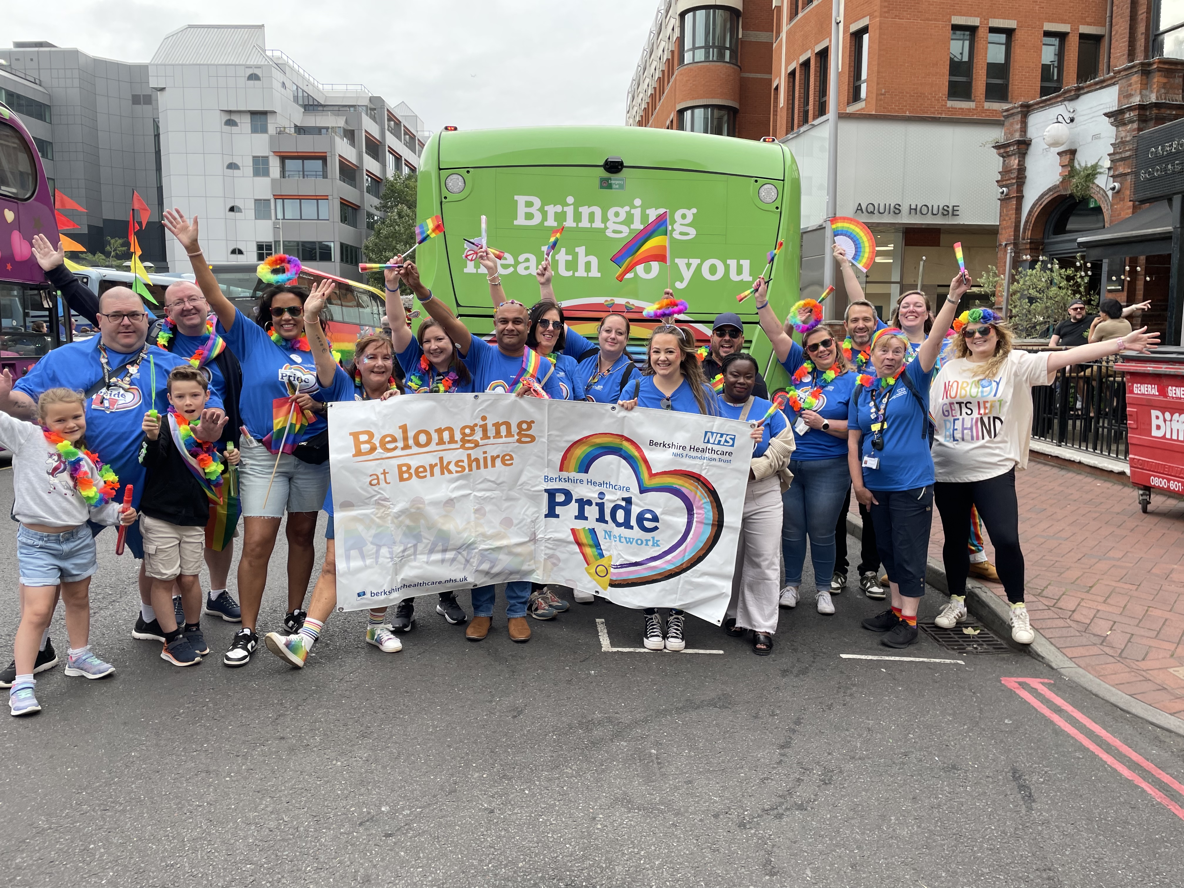 An image of our volunteers posing before the Pride march