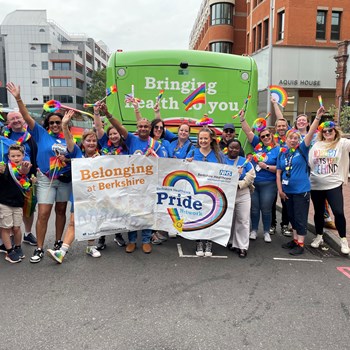 An image of our volunteers posing before the Pride march