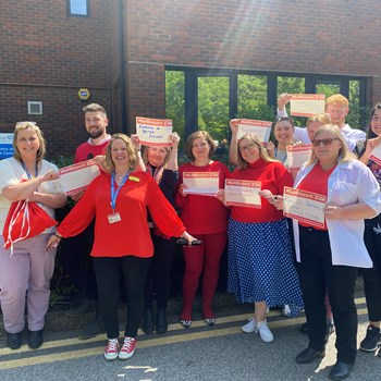 Research team celebrating Red4Research Day