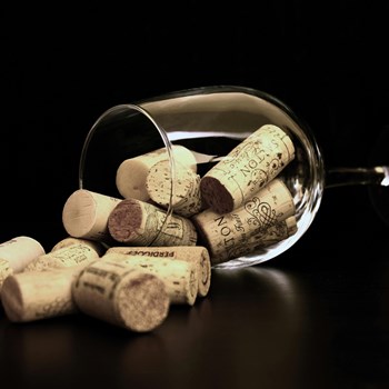Wine glass with corks