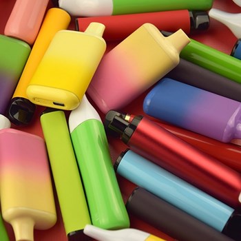 Pile of colourful disposable vapes