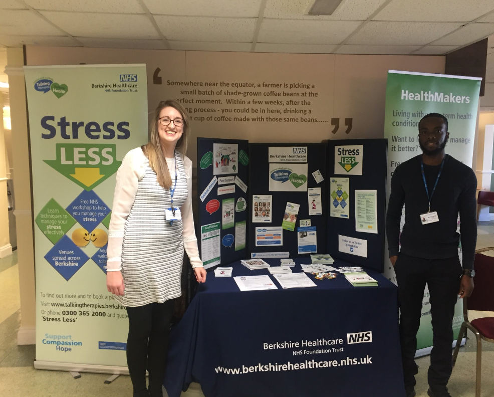 2 staff promoting our stress less courses