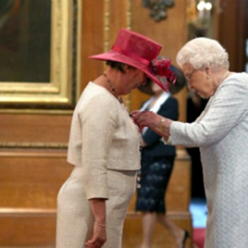 Alison Durrands receiving her MBE from the Her Majesty Queen