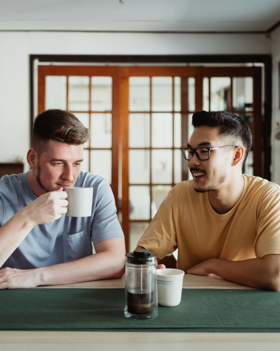 Two Men Having A Hot Drink