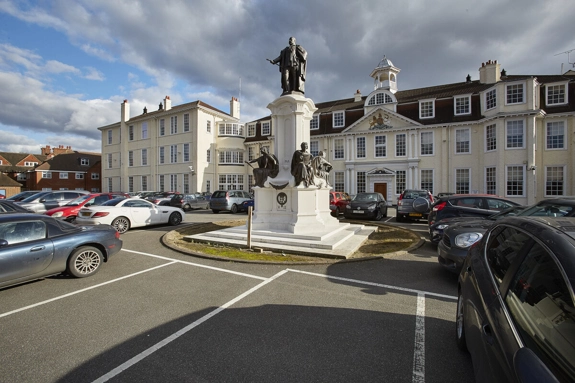 A statue of King Edward the seventh in front of the hospital